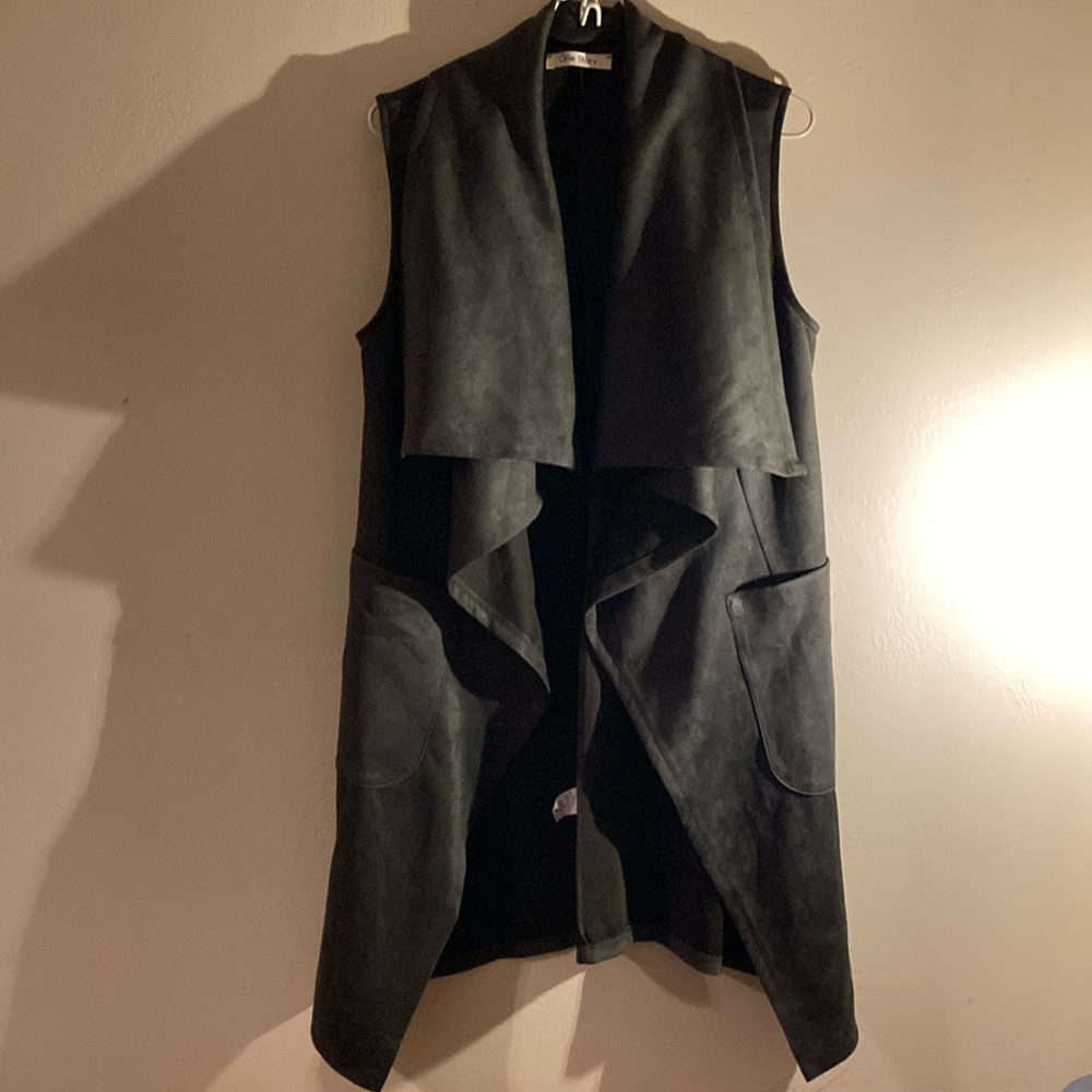 One Story dark green sleeveless jacket